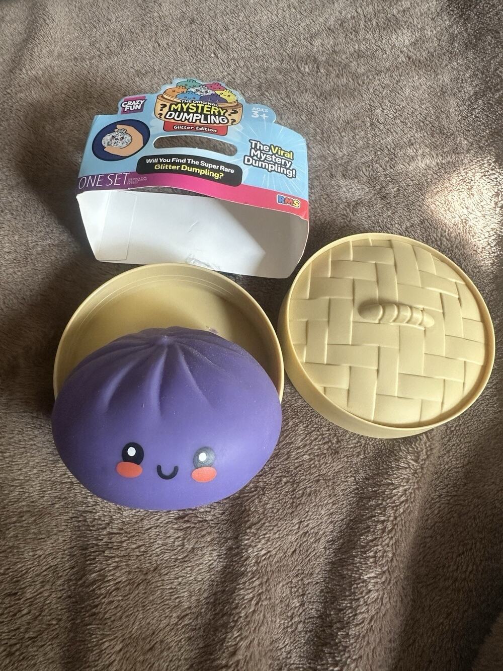 Crazy Fun Mystery Dumpling Gold Glitter Edition Blind Pack Squishy Open Purple
